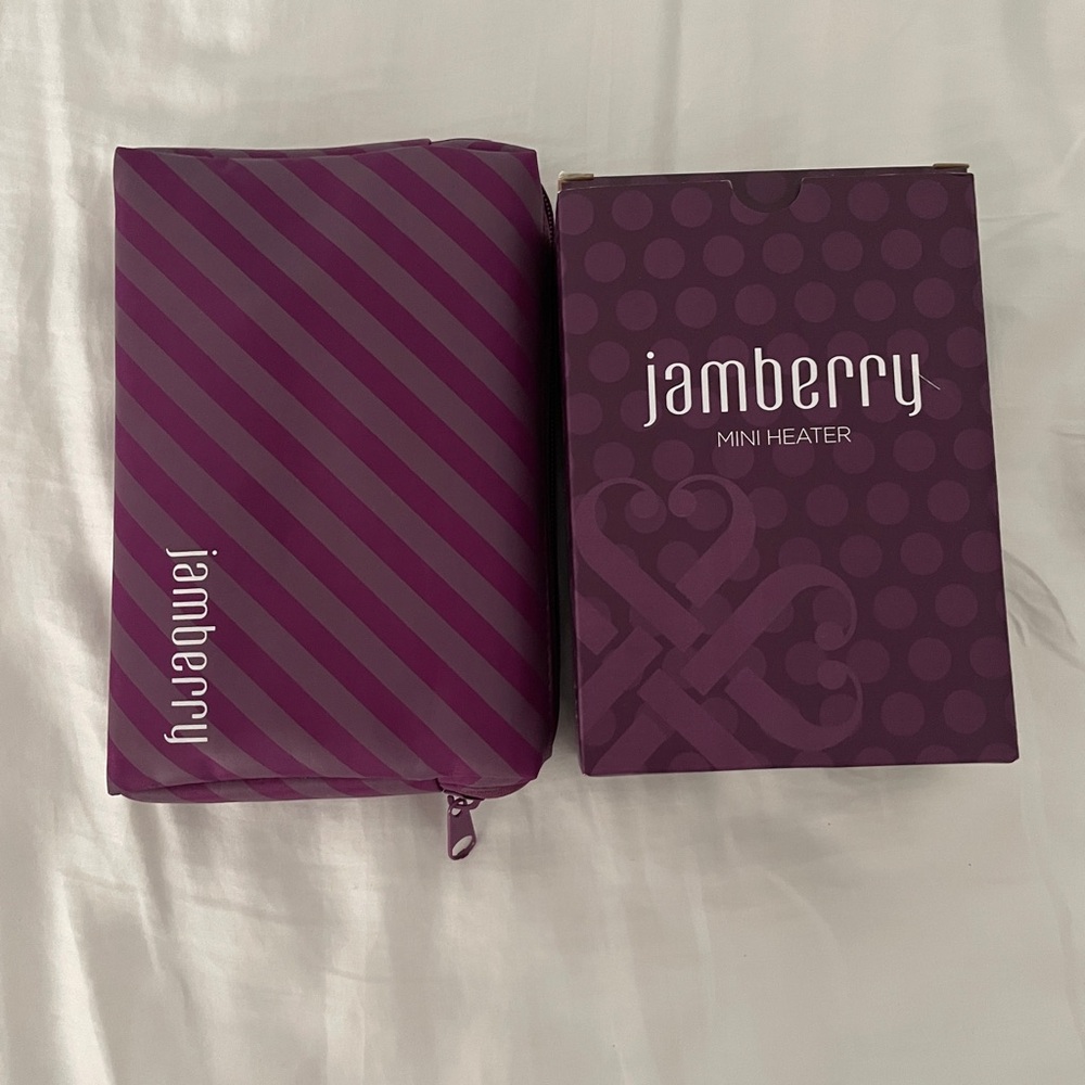 Lot with Jamberry mini heater, application kit, and 12 sets of nail designs